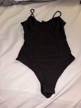 Women’s Black Ribbed One-Piece Bodysuit